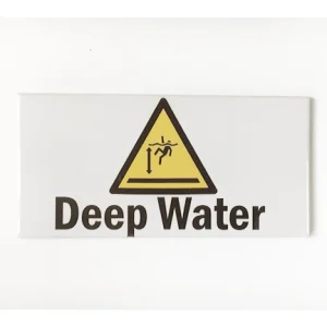 Australian-made porcelain pool depth marker seamlessly integrated into modern pool tiling.